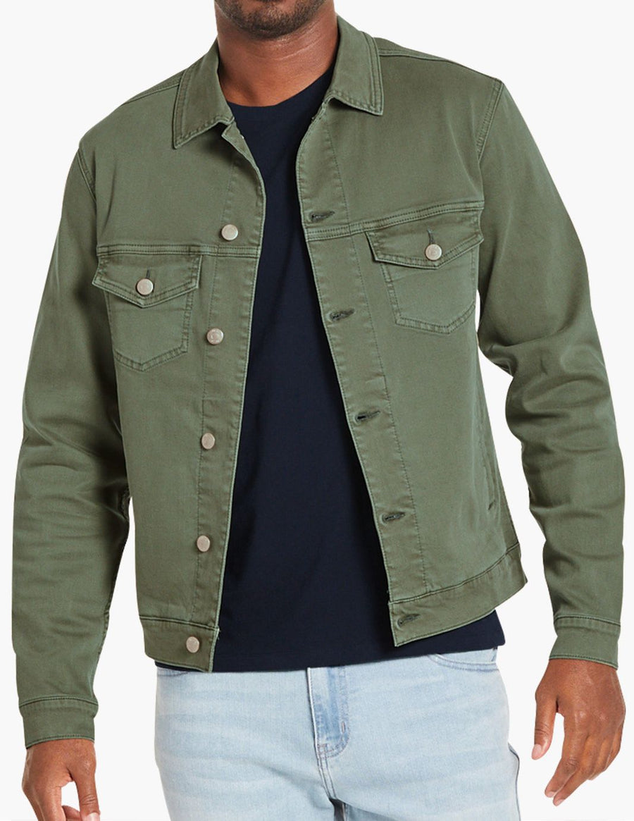 Men's olive-green denim jacket with button front, worn open over navy tee on model