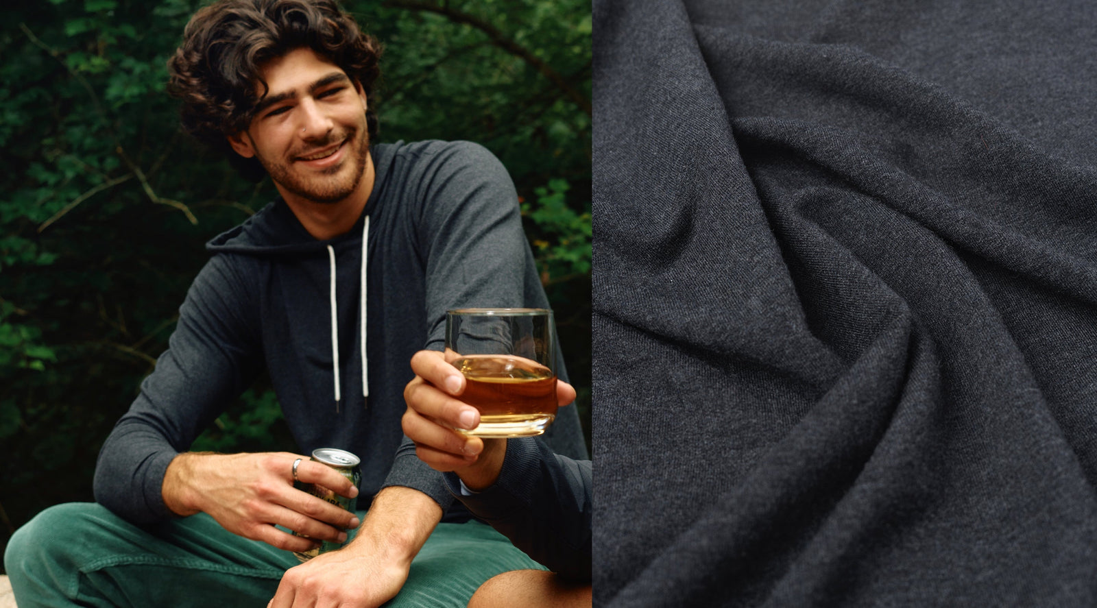Smiling man in a dark gray hoodie holding a glass and a can outdoors beside a close-up of dark gray fabric.