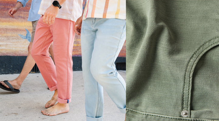 Three men playing cornhole outdoors wearing spring-colored stretch jeans (rose, cream, slate) with a stack of folded dyed jeans shown at right
