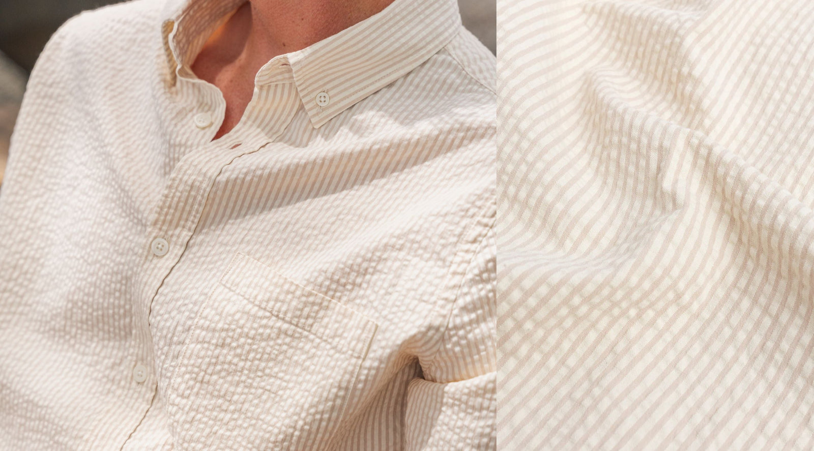 Close-up of cream-and-white seersucker button-down shirt showing collar, chest pocket, buttons, and textured striped fabric.
