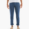 Front view of Atlantics twill drawstring pants on model showing relaxed fit, front patch pockets and rolled cuffs on white background