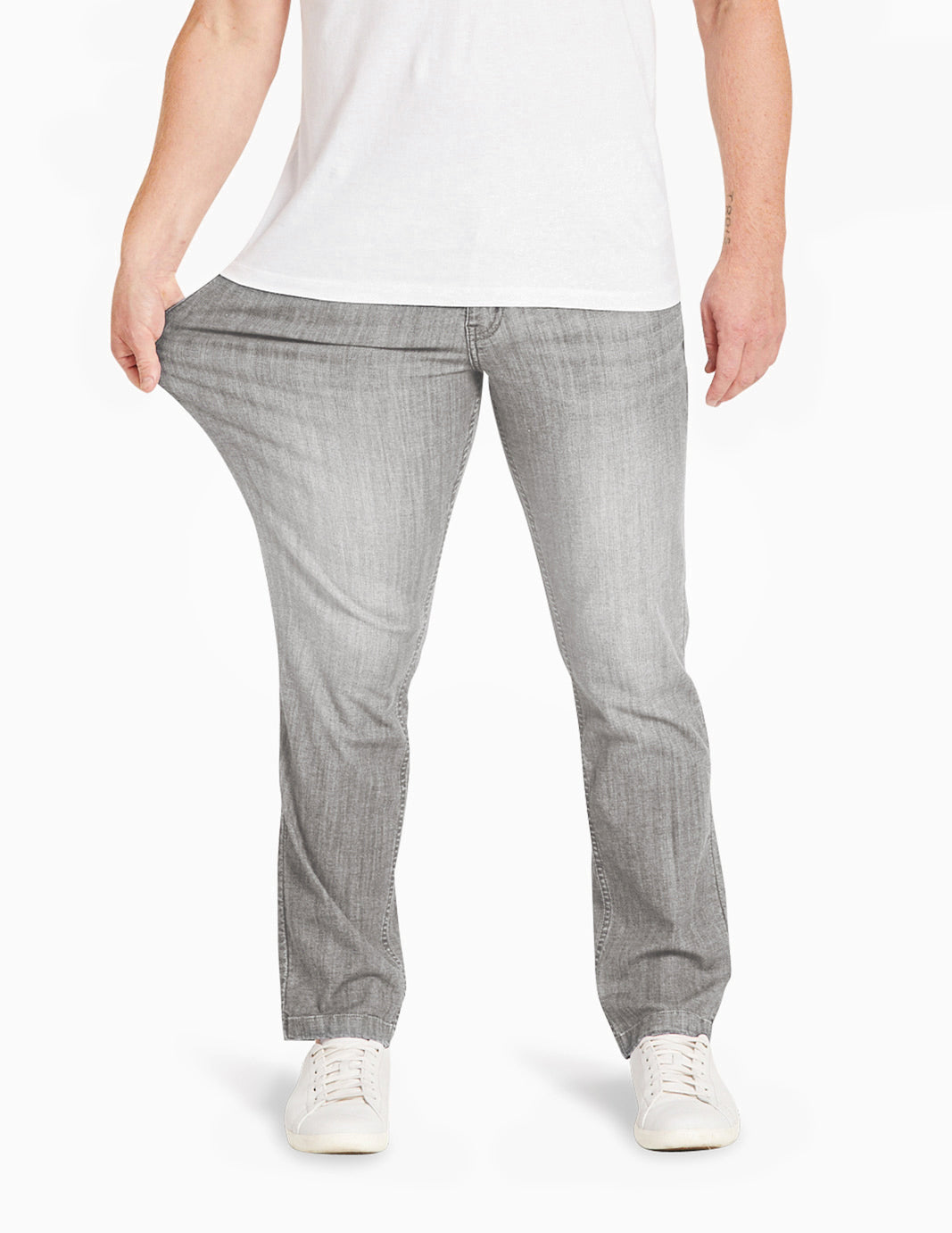 Model wearing Beans Coolmax jeans, showcasing their fit and flexibility.