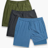Flat lay of three swim shorts (blue, charcoal, olive) showing elastic waistband, drawstring, textured quick-dry fabric on white background
