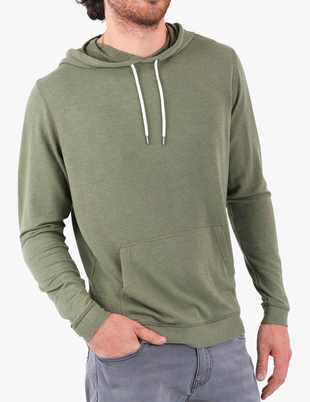 Model wearing a mossy green hoodie with drawstrings