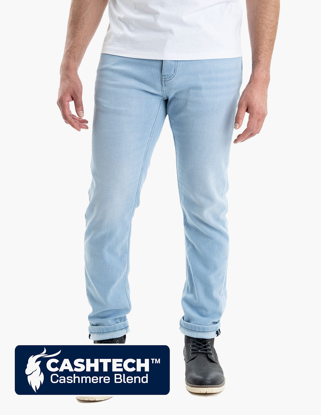 Light wash Cashtech™ jeans on a model standing with hands in pockets.