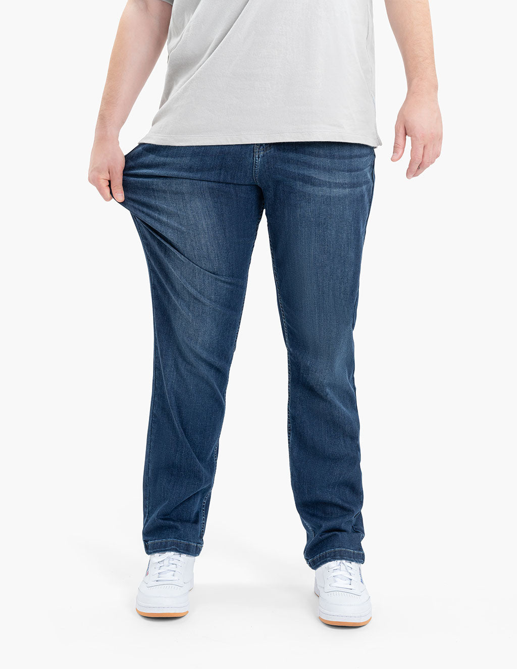 Model wearing Fultons Casual jeans, showing fit and style.