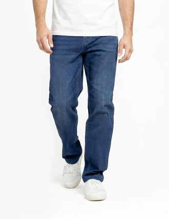 Front view of Fultons Casual blue denim jeans on model showcasing a relaxed casual fit with white background