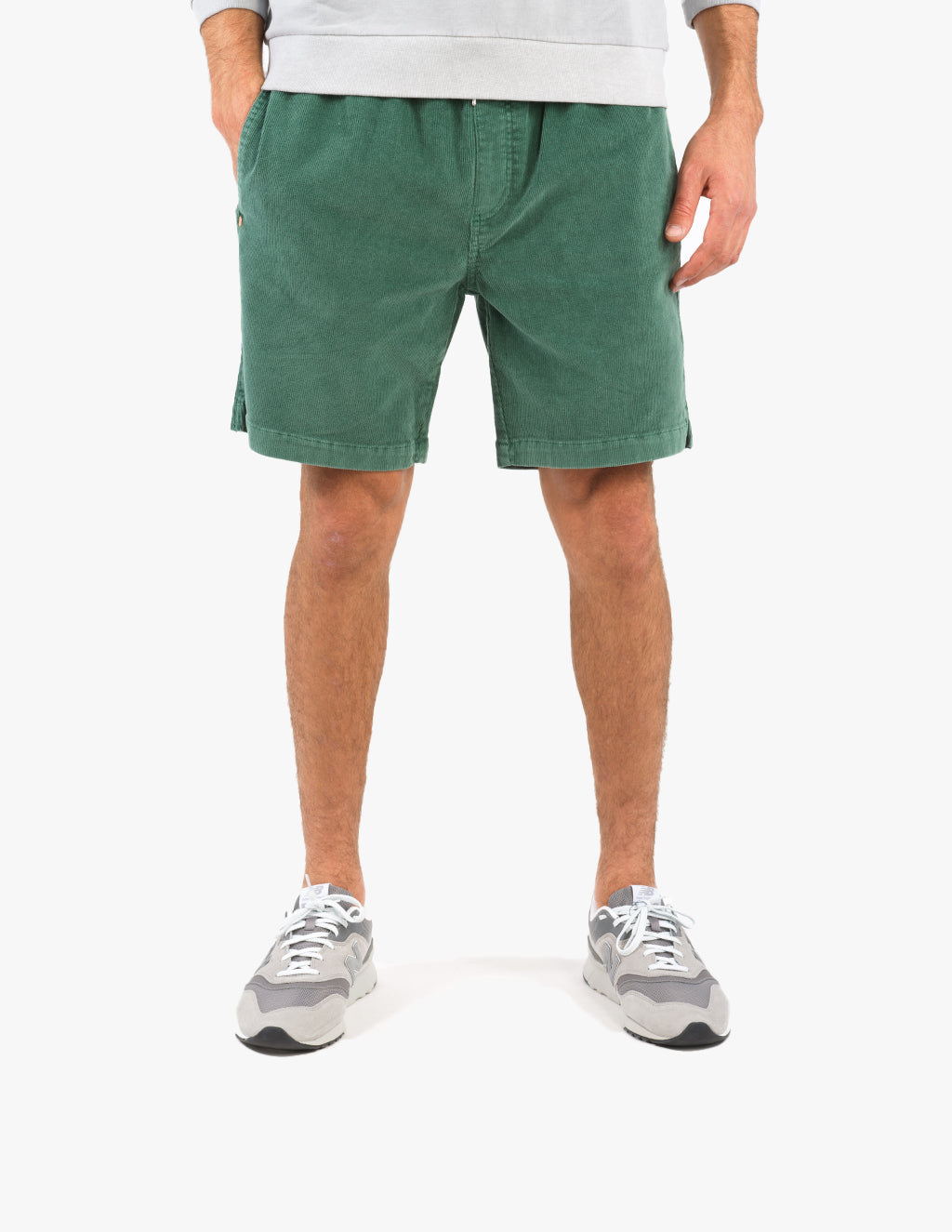 Model wearing green Hyperions shorts