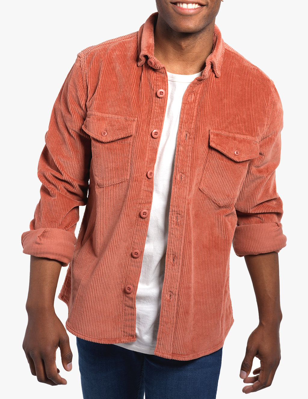 Model wearing a mauve corduroy utility shirt with two chest pockets.
