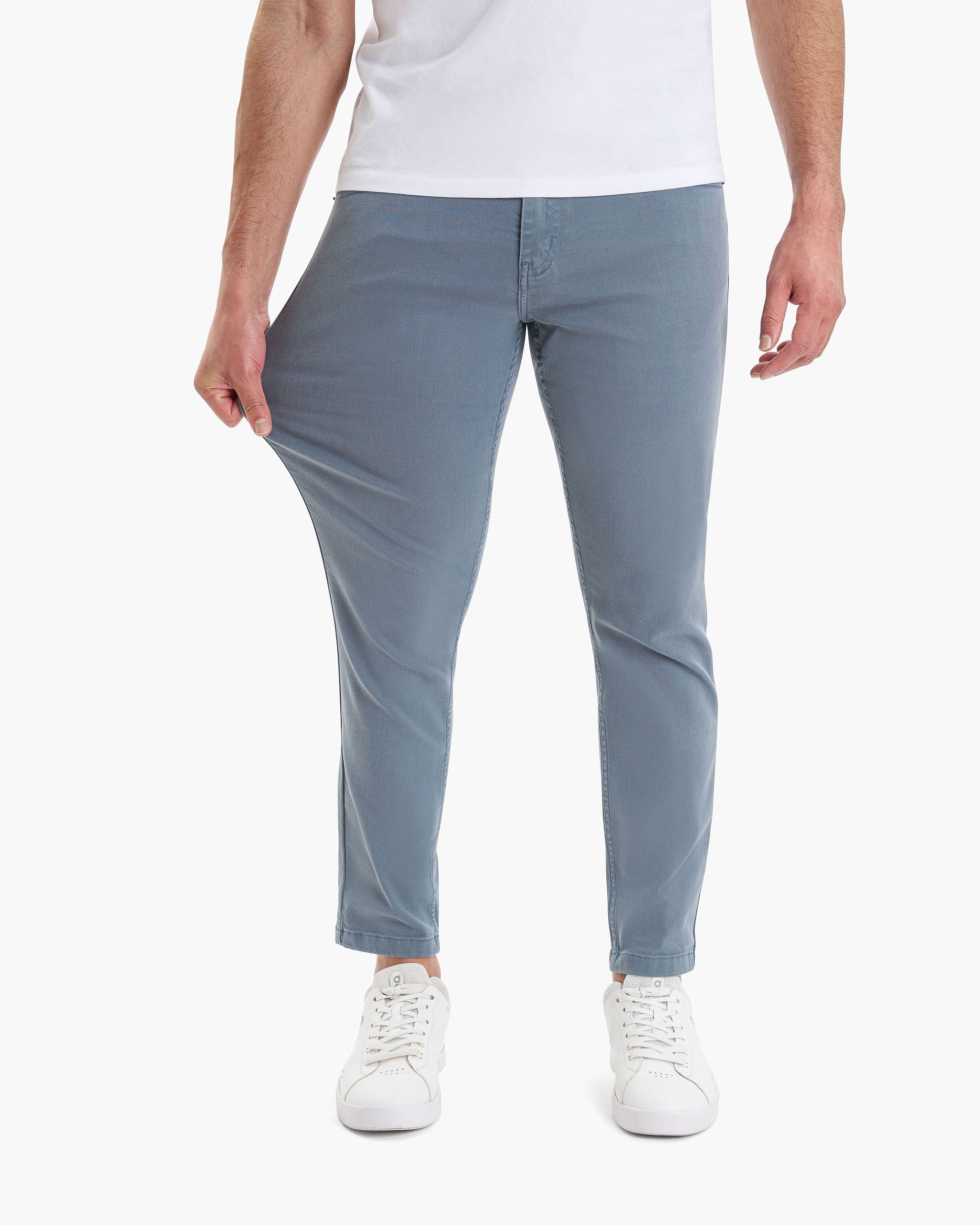 Model wearing blue-gray Logans Tapered jeans