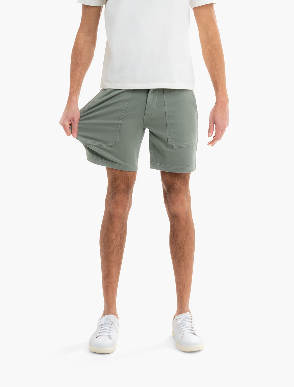 Front view of Twill Drawstring Shorts in Seagrass showcasing front patch pockets and stretch fabric on white background