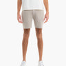 Front view of Twill Drawstring Shorts in Beachwoods with front patch pockets and mid-thigh fit on model against white background