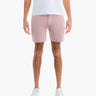 Front view of Chino Shorts in Fox Runs (light pink) showcasing mid-thigh length and tailored fit on model with white background