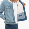 Denim trucker jacket opened to show white sherpa lining and Maysy logo on inner panel.