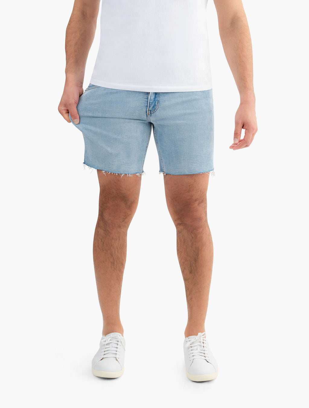 Men's vintage blue stretch jorts on a model