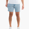 Men's vintage blue stretch jorts on a model