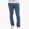 Front view of Classic Chinos in Saltwaters blue on model showing straight leg fit with white sneakers on white background