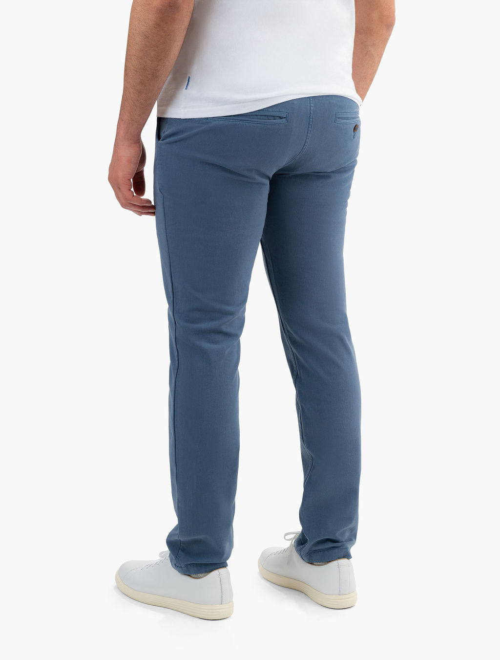 Back view of Saltwaters chinos in sea blue showcasing classic fit, rear welt pockets, and stretch fabric on a white background