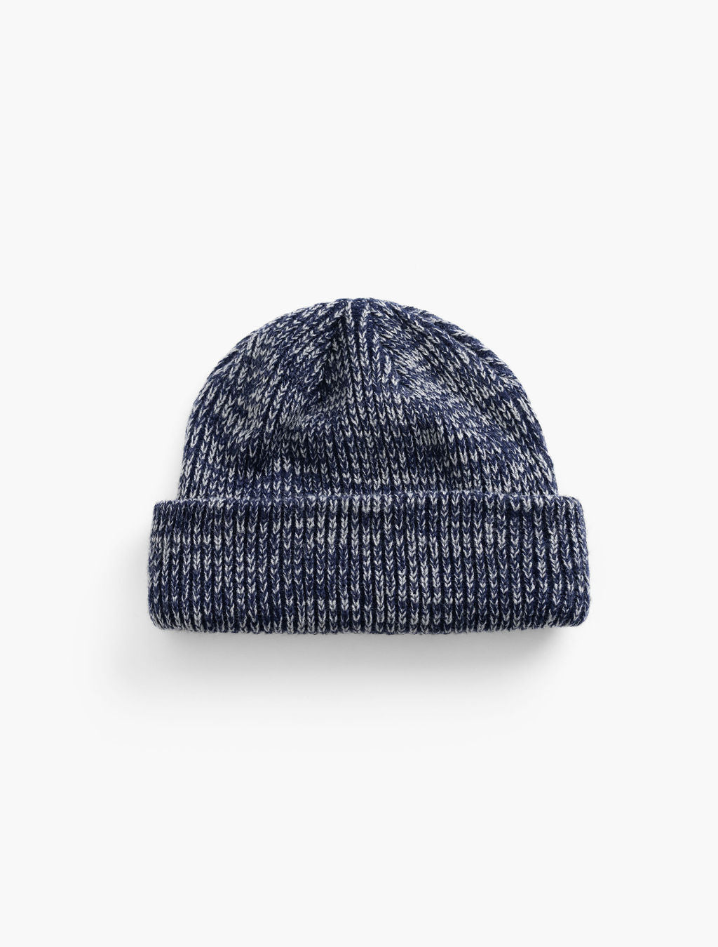 Navy and white marled knit beanie with folded cuff on white background.