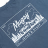 Blue tee back print: Mugsy script over mountain and trees, boxed design reading ESTD. 2016 and JEANS & STUFF
