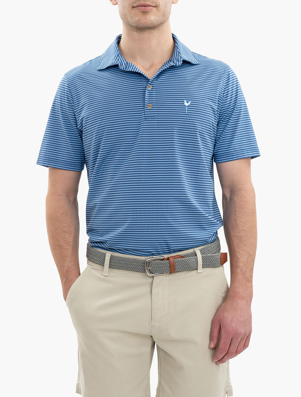 Man wearing a blue striped polo shirt with a small white rooster logo on the chest, beige shorts, and a woven belt with leather accents.
