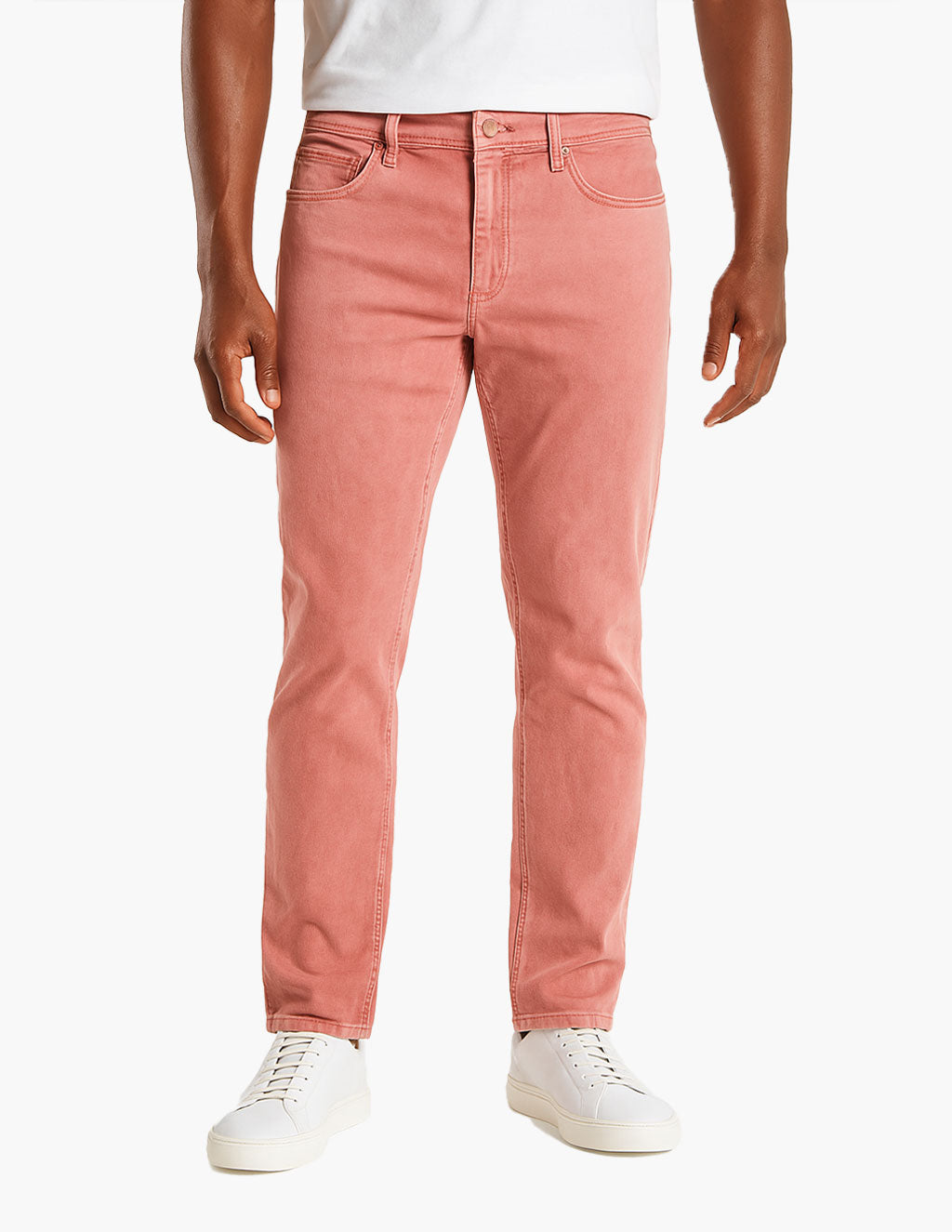 Model wearing Nantucket jeans in peach color