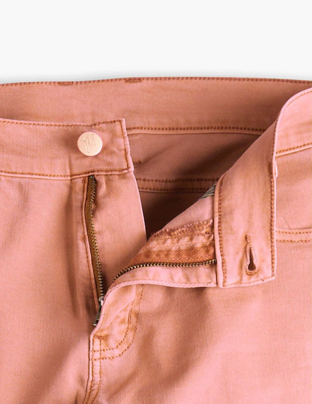 Pink pants with zipper and button, label inside reads 'SCOUTS'