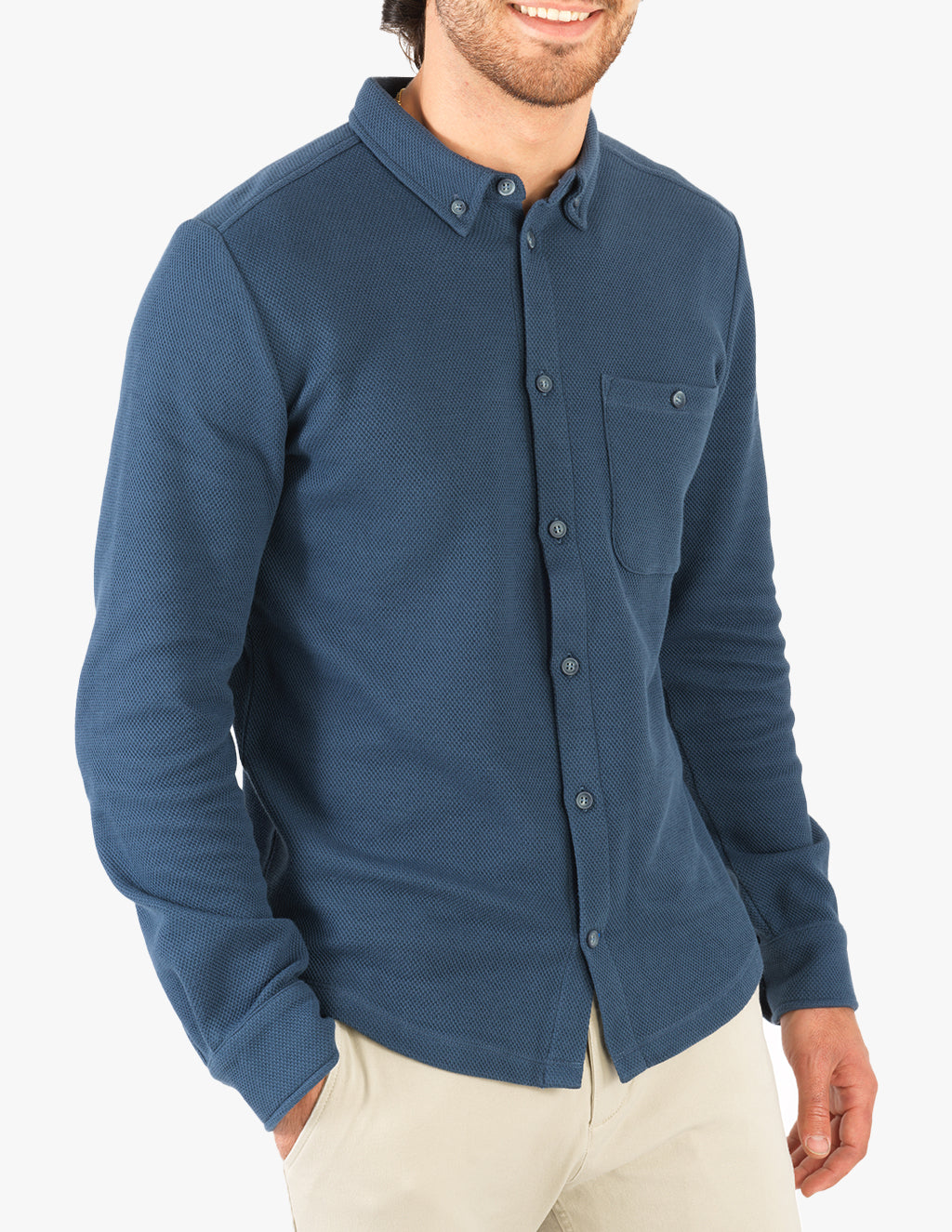 Model wearing a navy Louis shirt with buttons and a pocket.