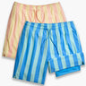 Flat lay of Party Pack 2 pack swim shorts with vertical stripes and drawstring elastic waist on white background