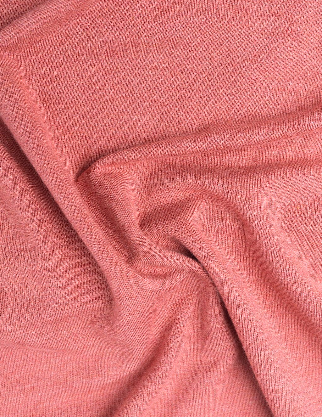 Washed red polo shirt fabric.