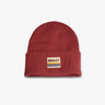Maroon knit cuffed beanie with a patch reading MUGSY and horizontal yellow, orange and blue stripes