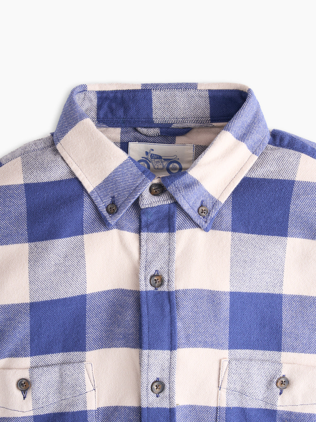 Blue-and-white buffalo-check flannel shirt with button-down collar, buttons, chest pockets and sewn motorcycle label.