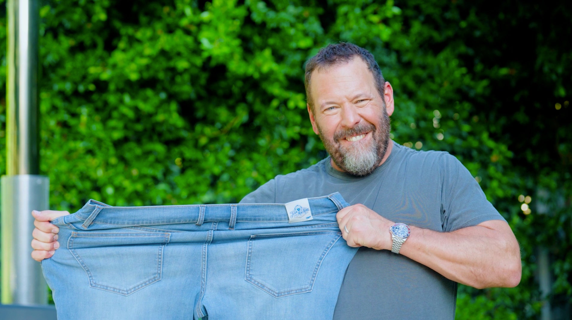 Bert Kreischer stretching a pair of BK x Daytonas