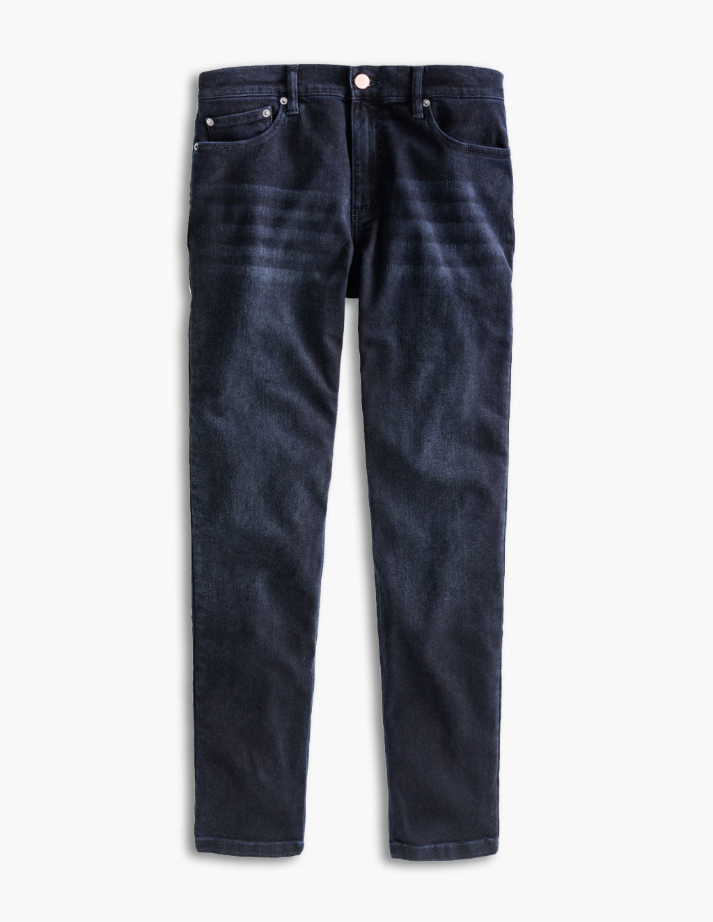 Dark indigo slim straight five-pocket pants laid flat, subtle horizontal whiskering at upper thighs.