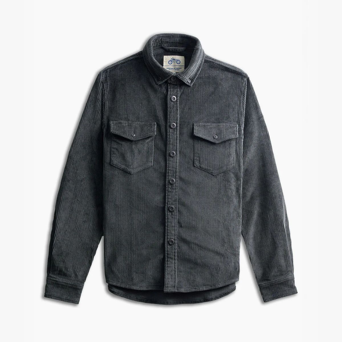Dark gray corduroy long-sleeve button-up shirt with two flap chest pockets on white background