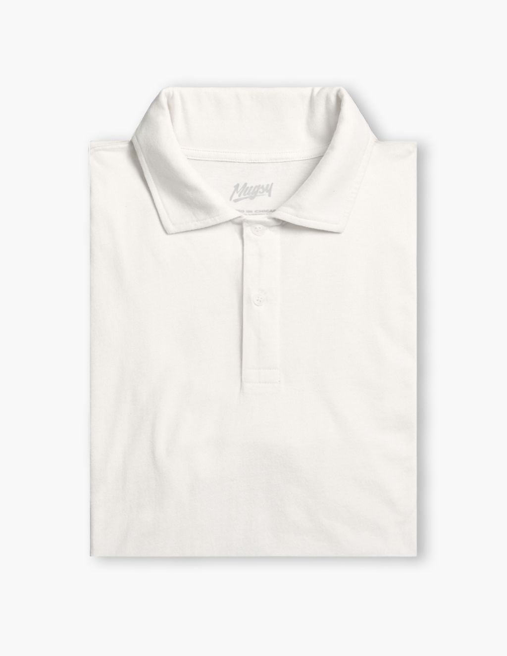 White folded polo shirt with button placket and faint Mugsy collar label