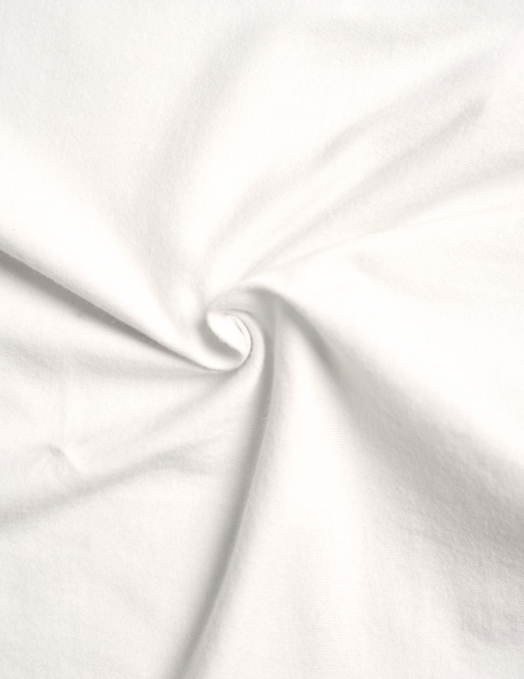 White cotton fabric twisted into a central spiral, showing soft texture and drape.