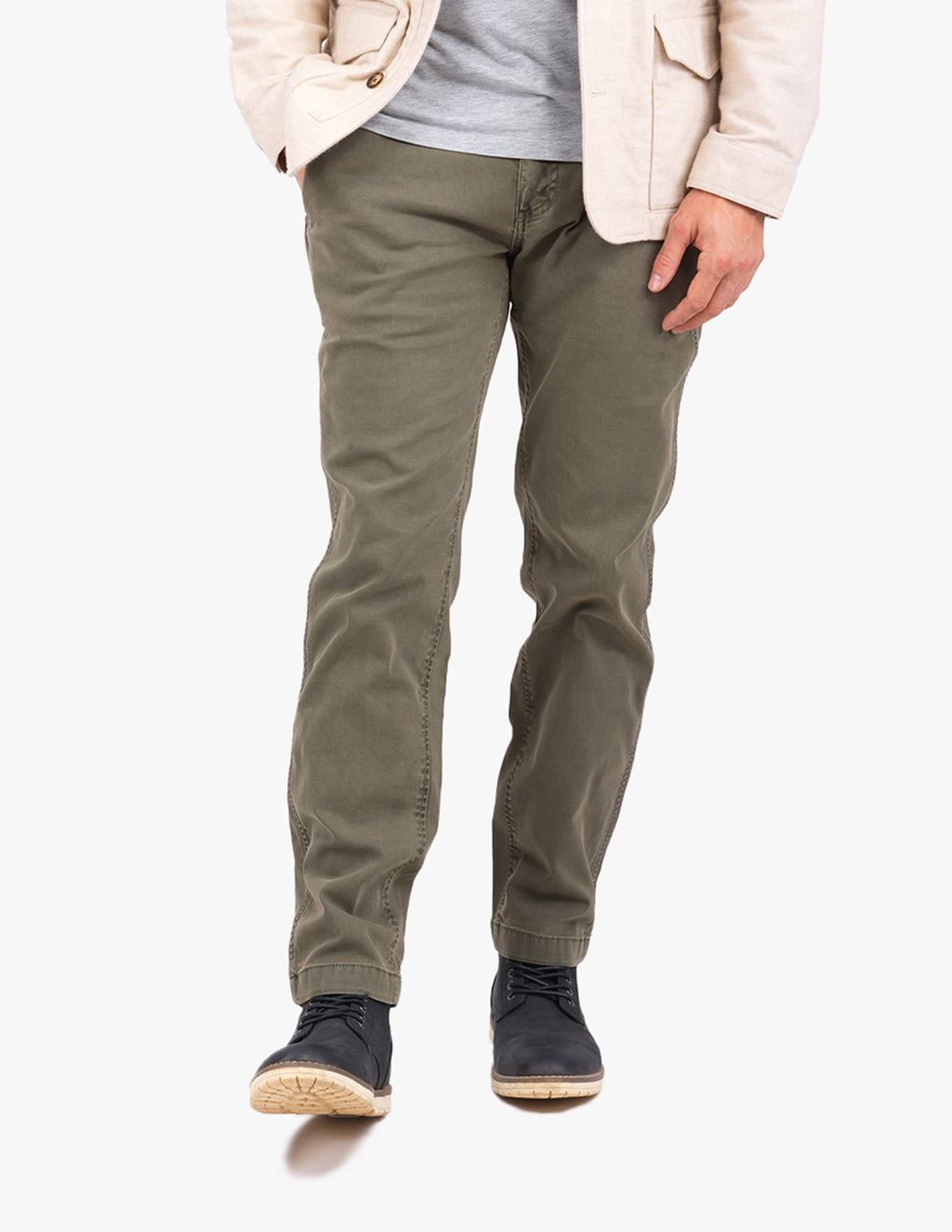Model wearing Carters canvas utility pants in olive green.