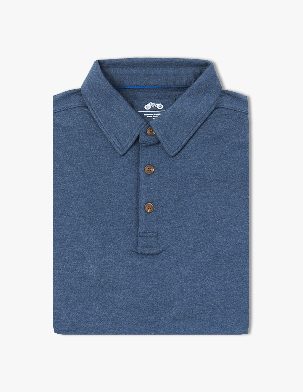 Folded blue polo shirt with three brown buttons and a collar
