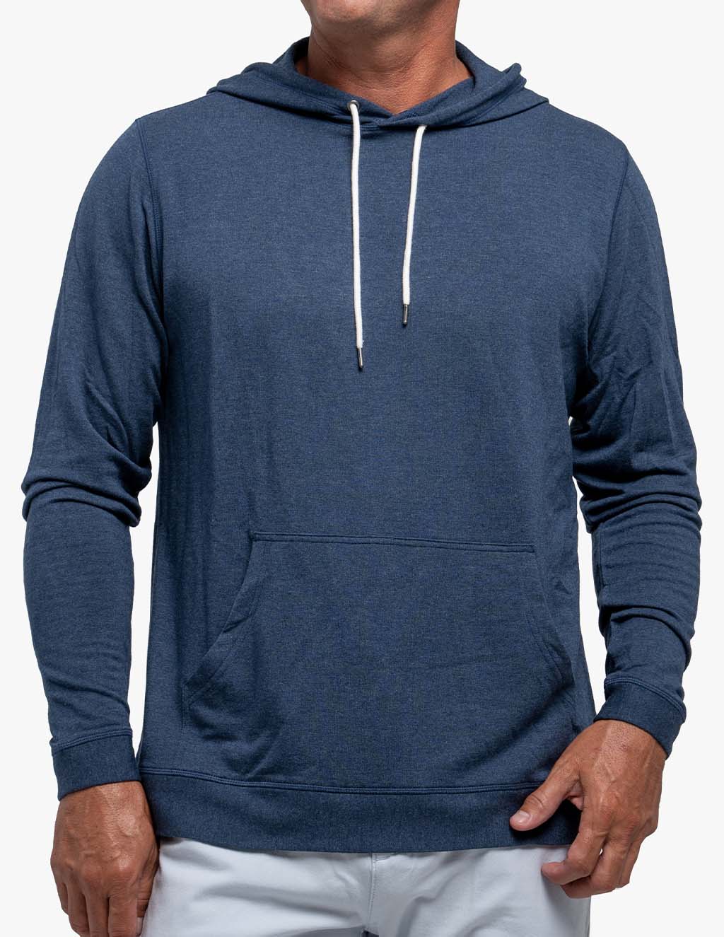 Model wearing a blue hoodie with a front pocket and drawstrings