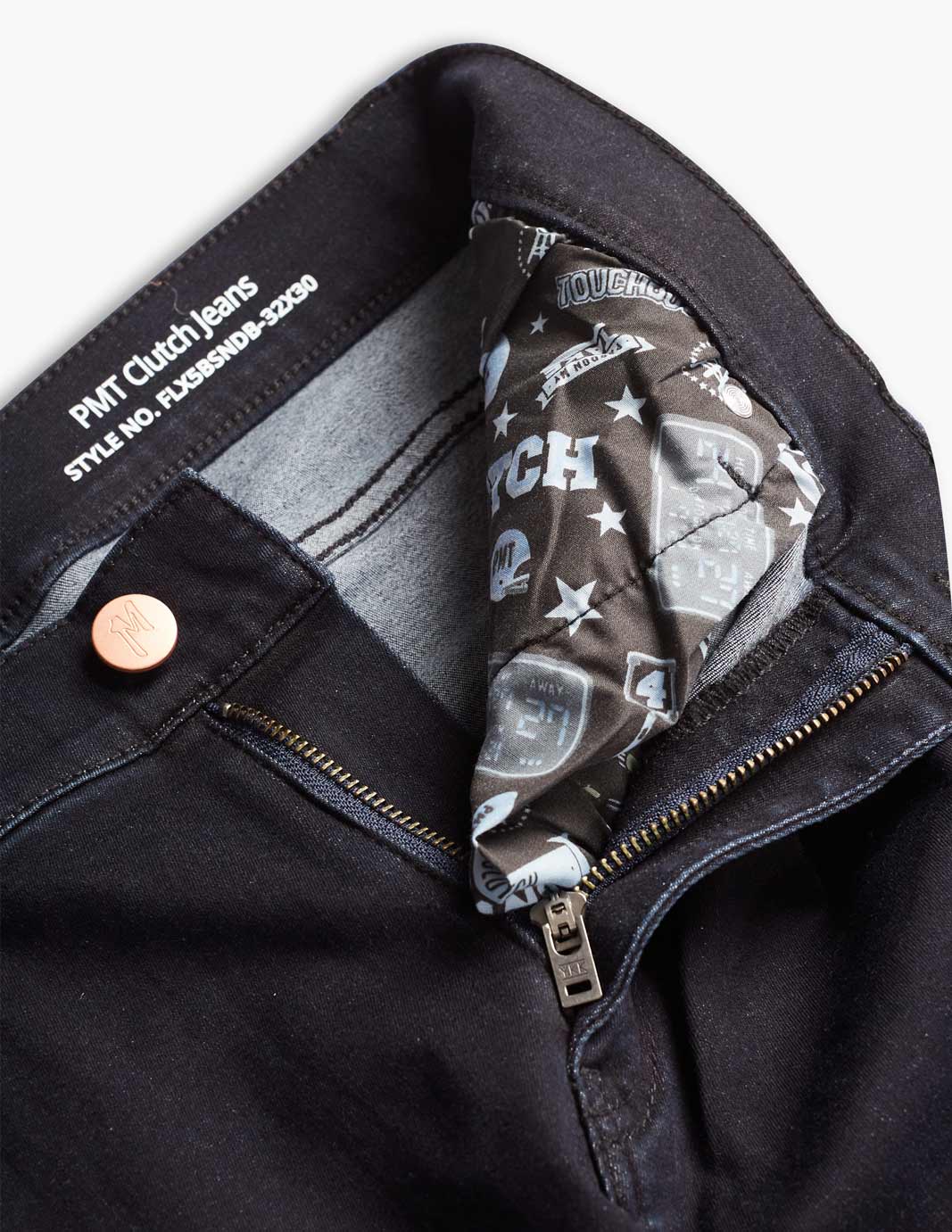 Inside view of PMT Clutch Jeans showing zipper and patterned fabric