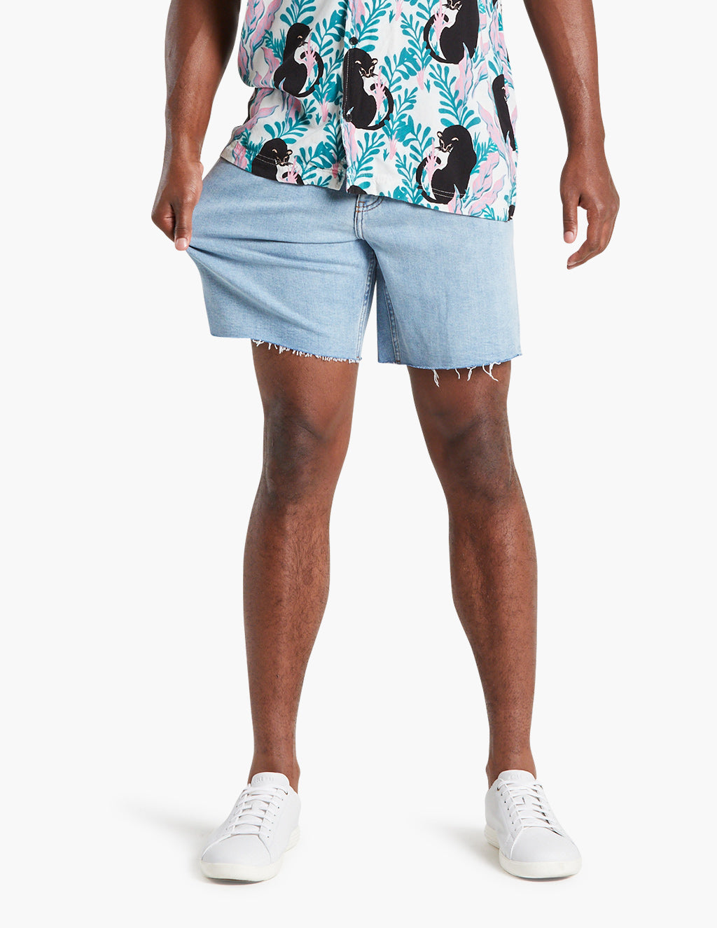 Men's vintage blue stretch jorts on a model