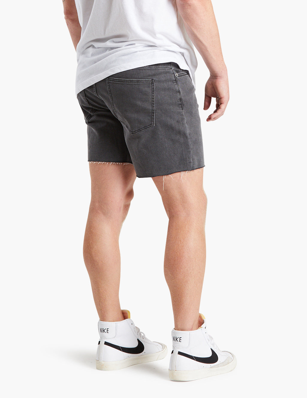 Men's gray black stretch denim jorts, back view, showing fit and style.