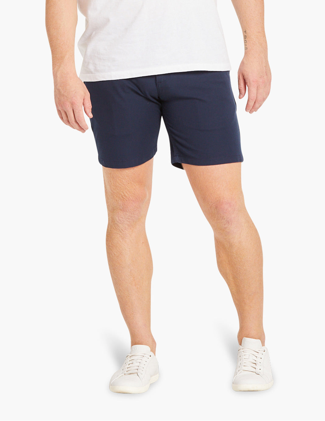Model wearing navy summer stretch shorts, showcasing comfort and style.