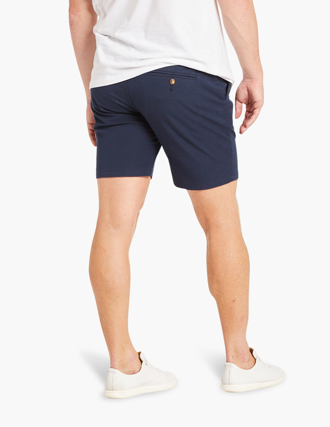 Model wearing navy summer stretch shorts from the back