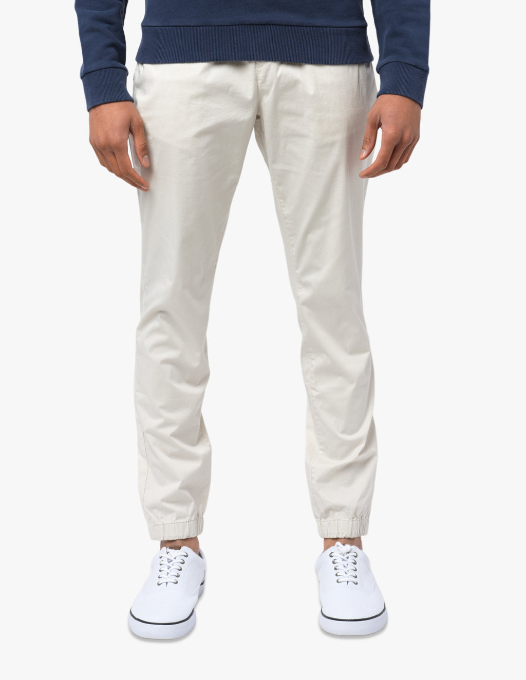 Lightweight Sandys joggers in stone white color, worn by a model standing upright.