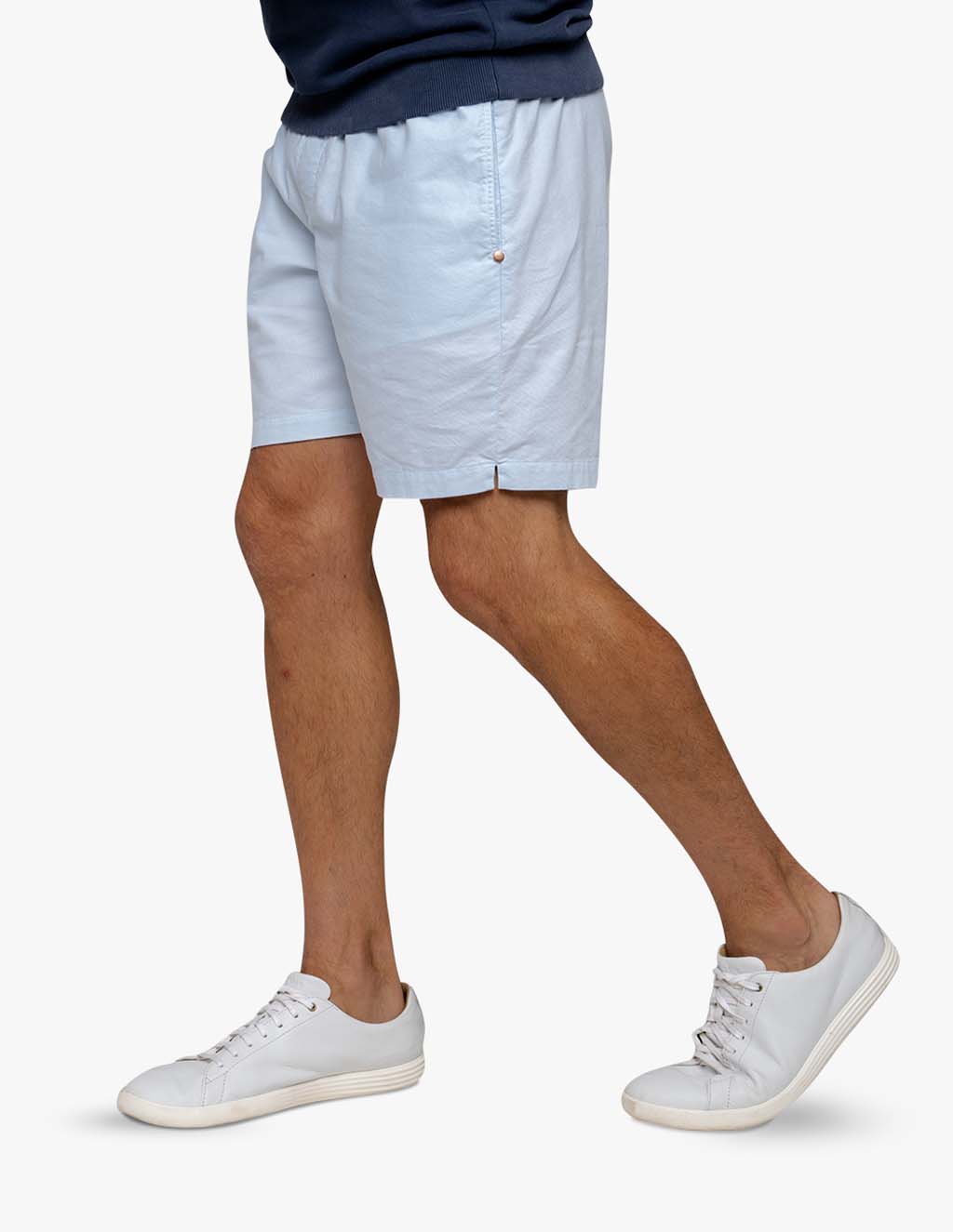 Light blue men's stretch drawstring shorts worn by a model