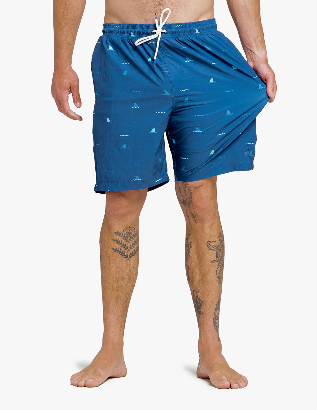 Men's navy swim shorts with shark pattern, featuring a comfortable stretch fabric.