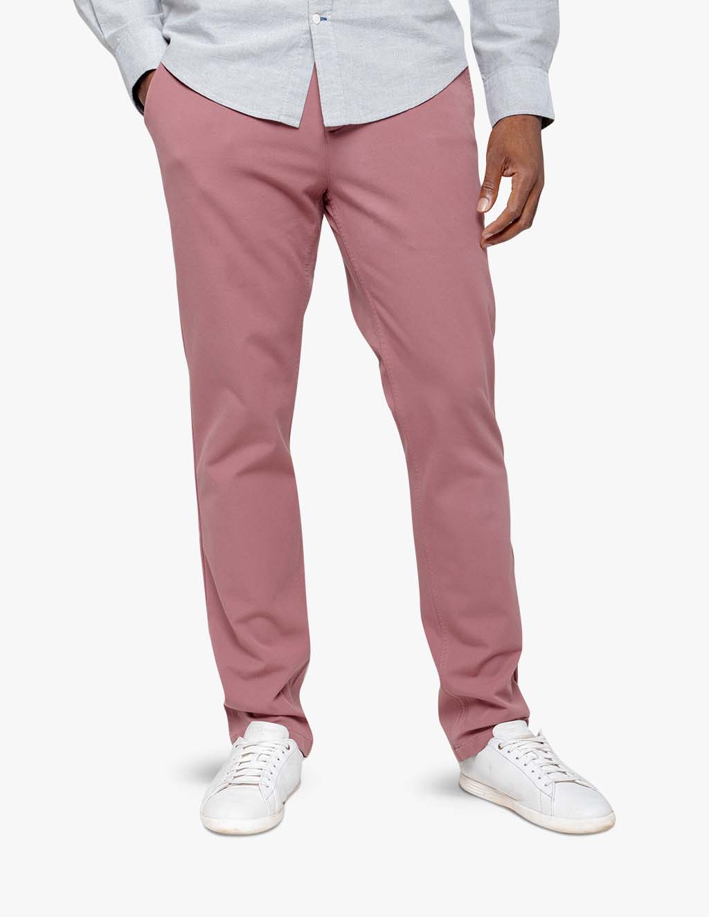 Men's washed red stretch chinos on a model